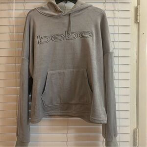 Bebe sport women’s grey cropped plush hooded , new and clean with tag